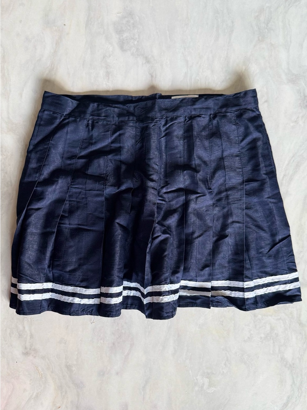 Love + harmony women’s size large Navy Pleated Mini Skirt with White Stripe Trim